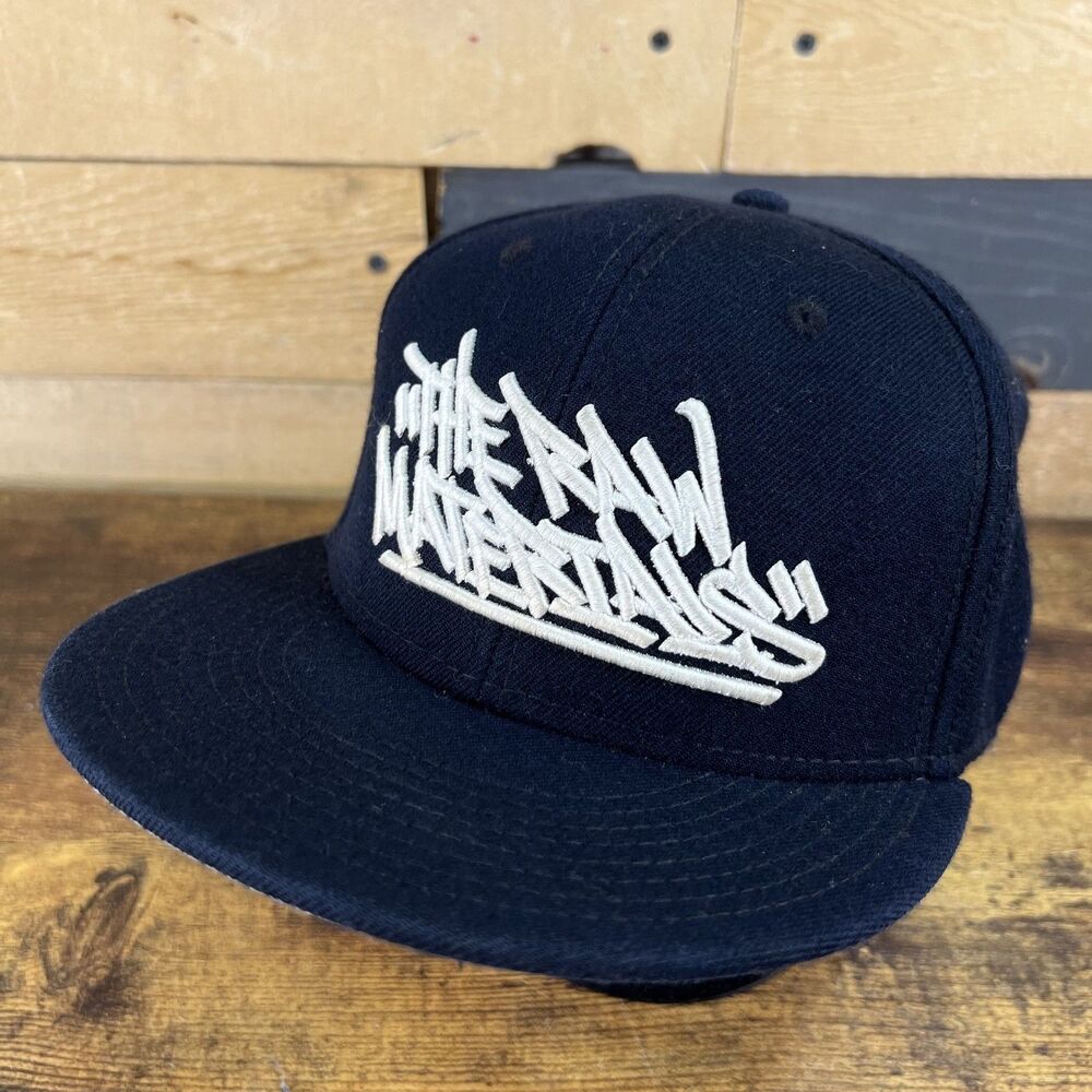 The Raw Materials Trucker Embroidered Black SnapBack Adjustable Hat Baseball Cap